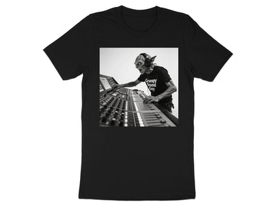 Grumpy Sound Guy graphic on a black t-shirt.