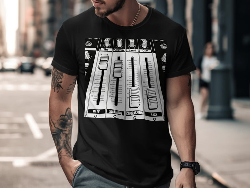 Black t-shirt with a soundboard graphic: "The Grumpy Sound Guy".