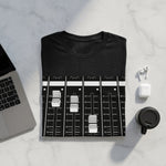 Black t-shirt with white graphic of audio mixer sliders and knobs.