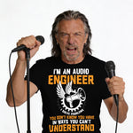 Man wearing black t-shirt with "Audio Engineer" text and graphic.