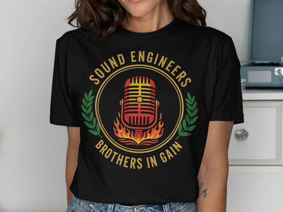 Black t-shirt with vintage microphone and flames, "Sound Engineers Brothers in Gain" text.