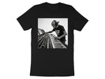 Grumpy Sound Guy graphic on a black t-shirt.